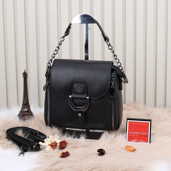 Motto siyah hem elde tutmalı hem yandan asmalı çanta