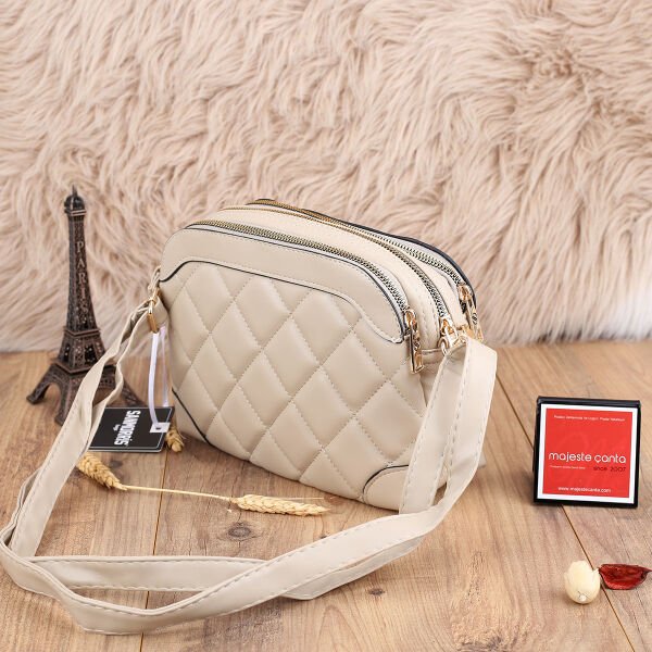 Sanmorris Üç Gözlü Bej Yandan Asmalı Çanta